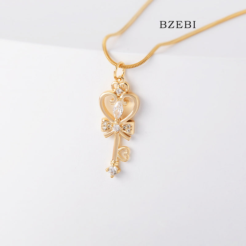 BZEBI 18k Gold Plated Cubic Zirconia Key Staff Necklace for Women with Box