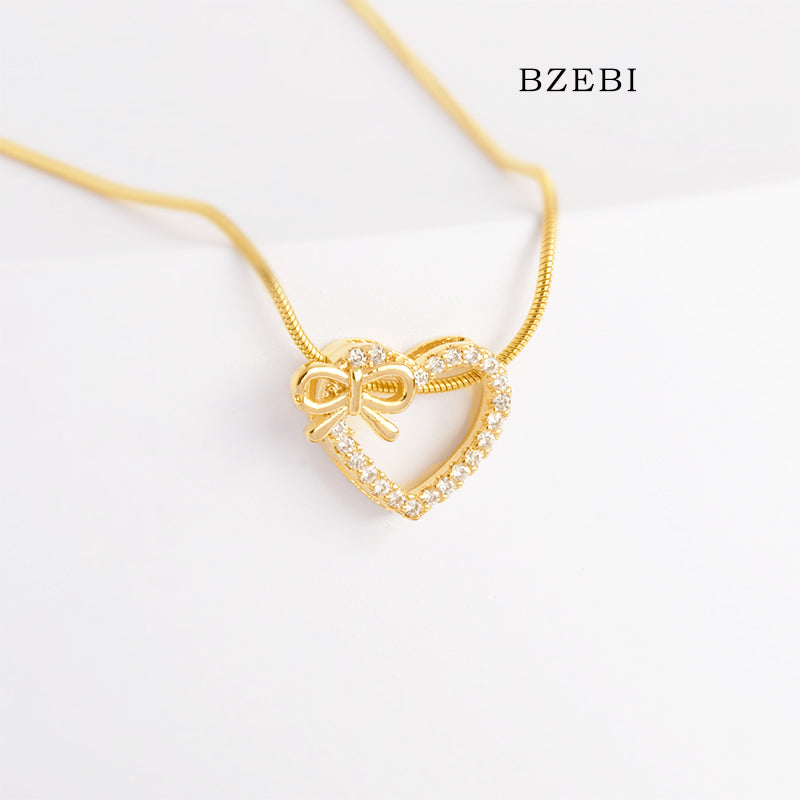 BZEBI 18k Gold Plated Cubic Zirconia Love Bow Girl Necklace for Women with Box