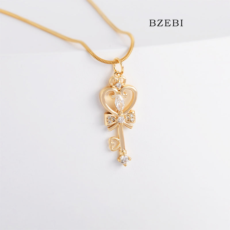 BZEBI 18k Gold Plated Cubic Zirconia Key Staff Necklace for Women with Box