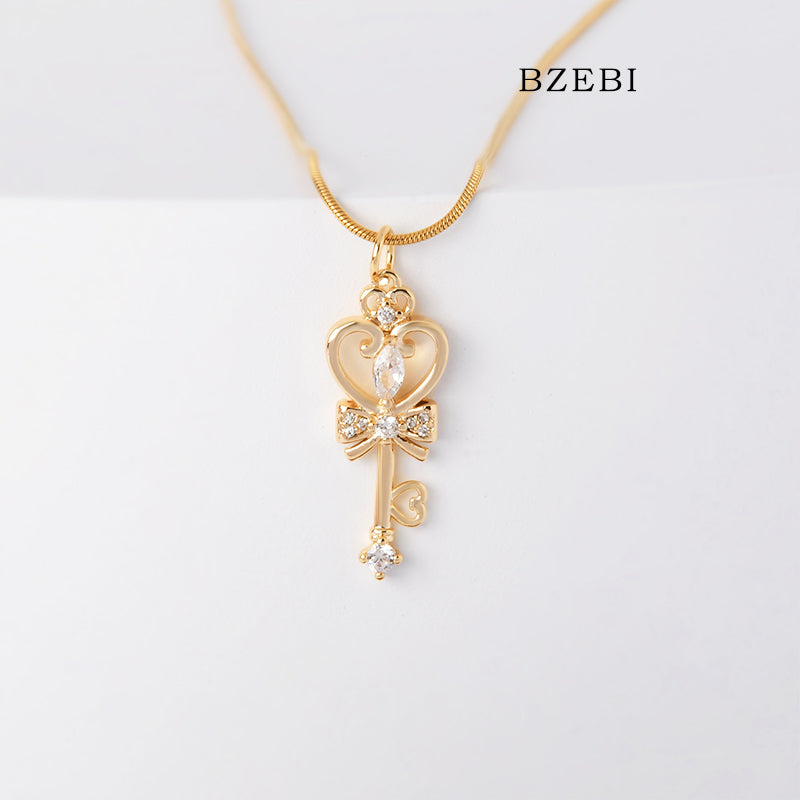 BZEBI 18k Gold Plated Cubic Zirconia Key Staff Necklace for Women with Box